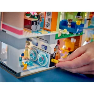 LEGO 42670 Les appartements et boutiques de Heartlake City — comparatif marchands sur Planet-Brick (vue détail 7)